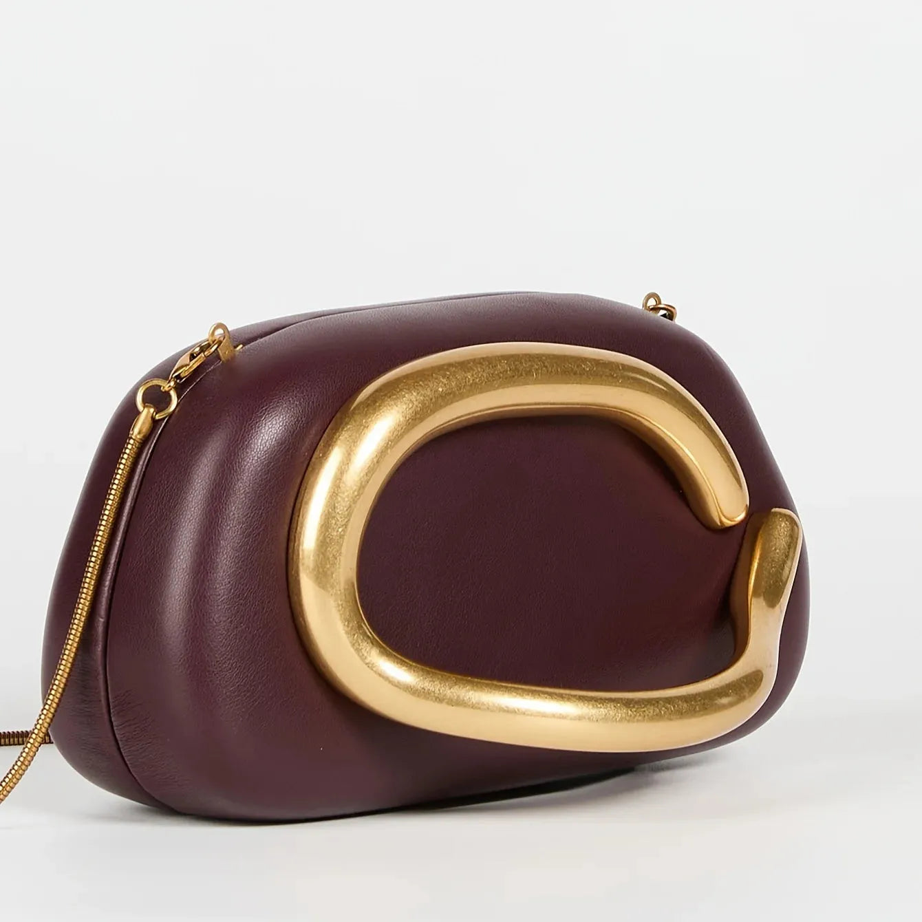 Gold Handle Clutch Bag